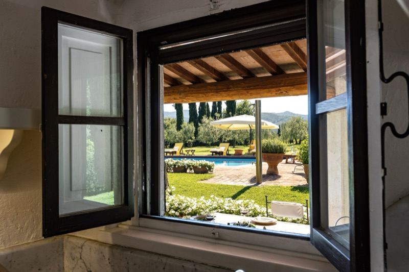 The kitchen window onto the pool