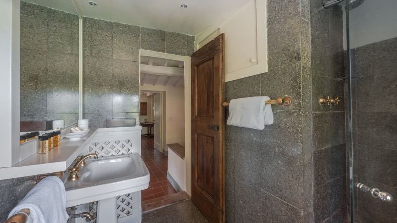 The grey stone bathroom with shower