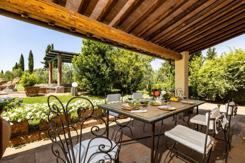 The beamed veranda with the table laid