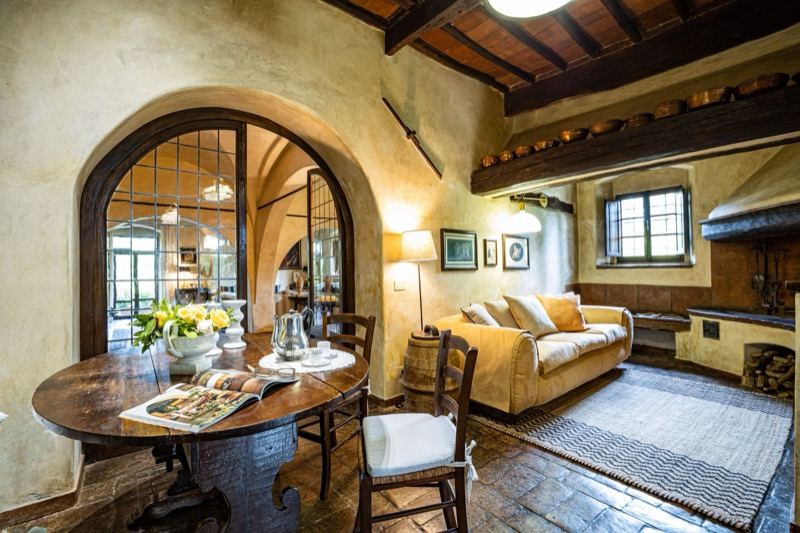 The sitting room with the arched glass door and sofa