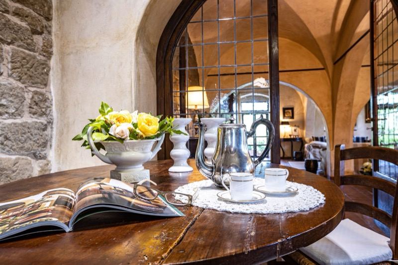 Tea served beside the arched window