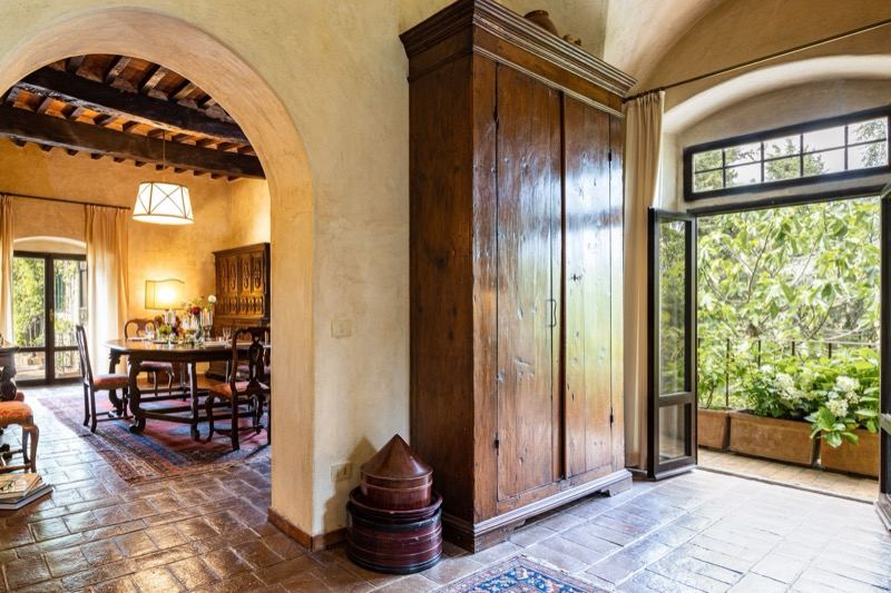 The dining room with the door open onto the garden