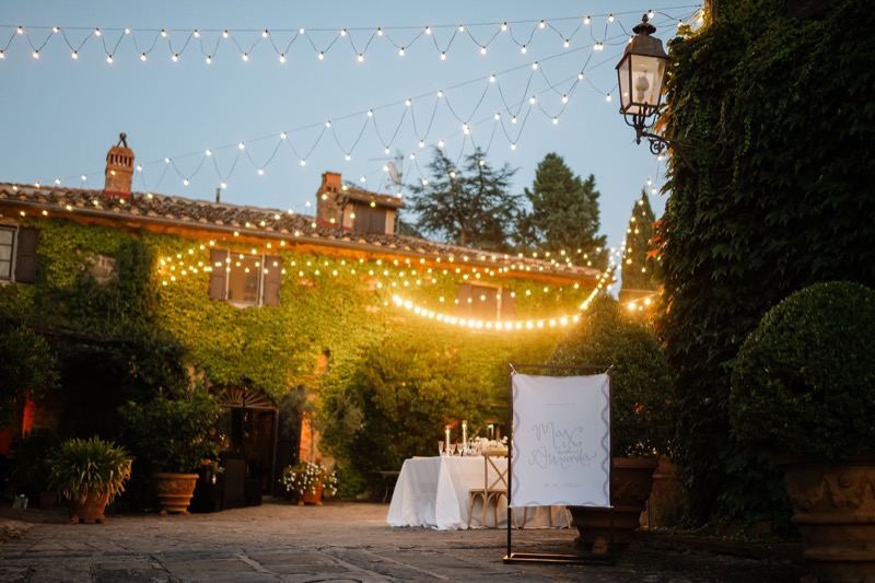 The villa's facade lit at dusk