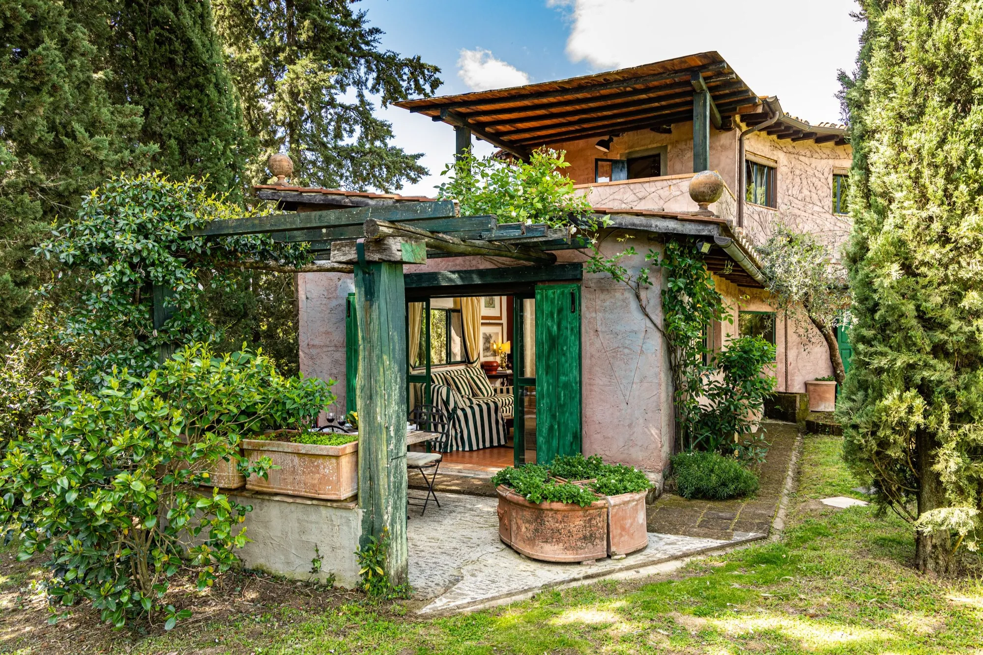Villa al Prato with its pergola and green shutters